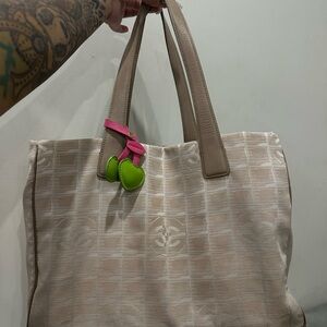 Chanel travel line tan bag